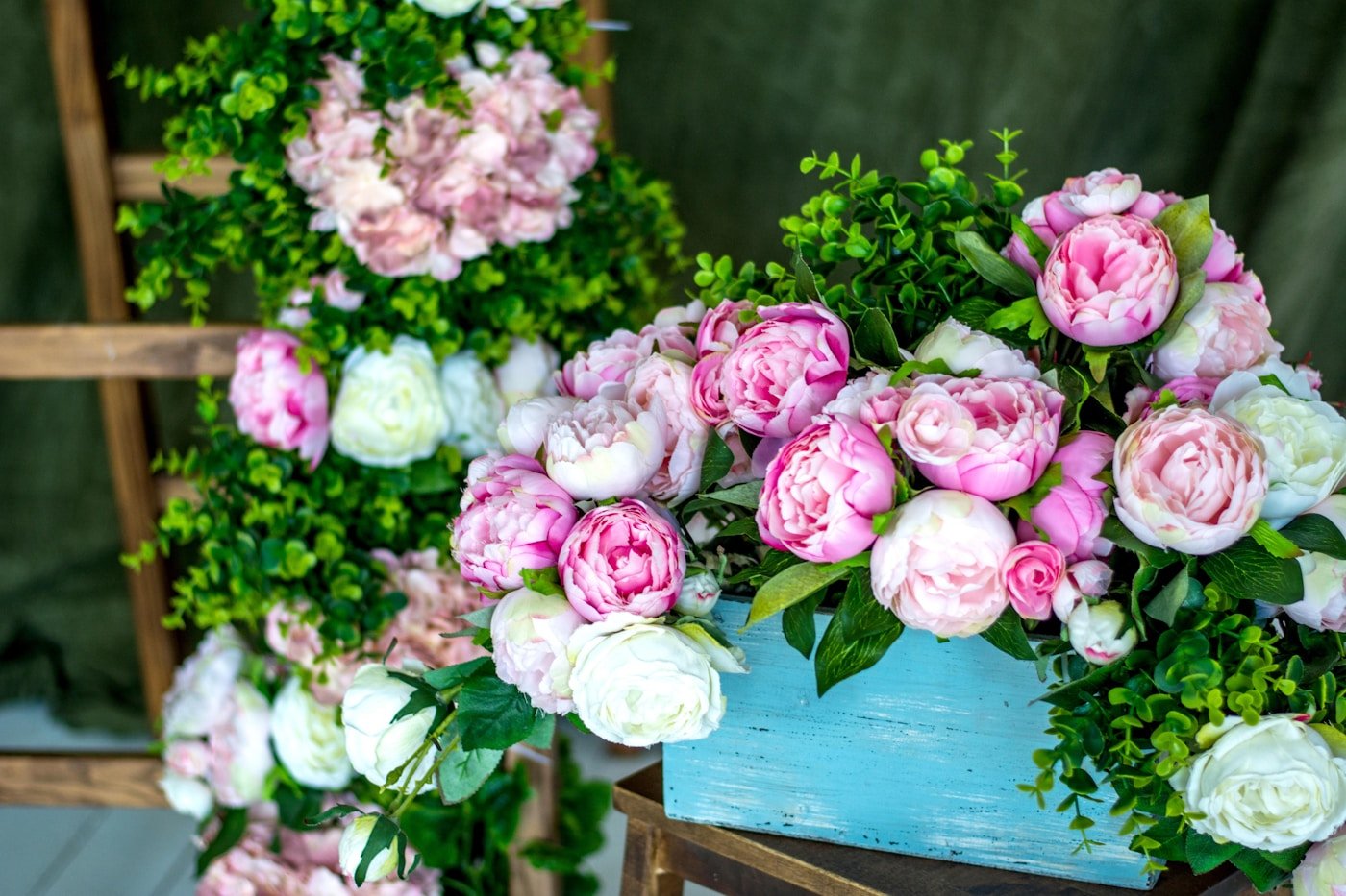 A soft arrangement of blush and pink peonies in gentle bloom